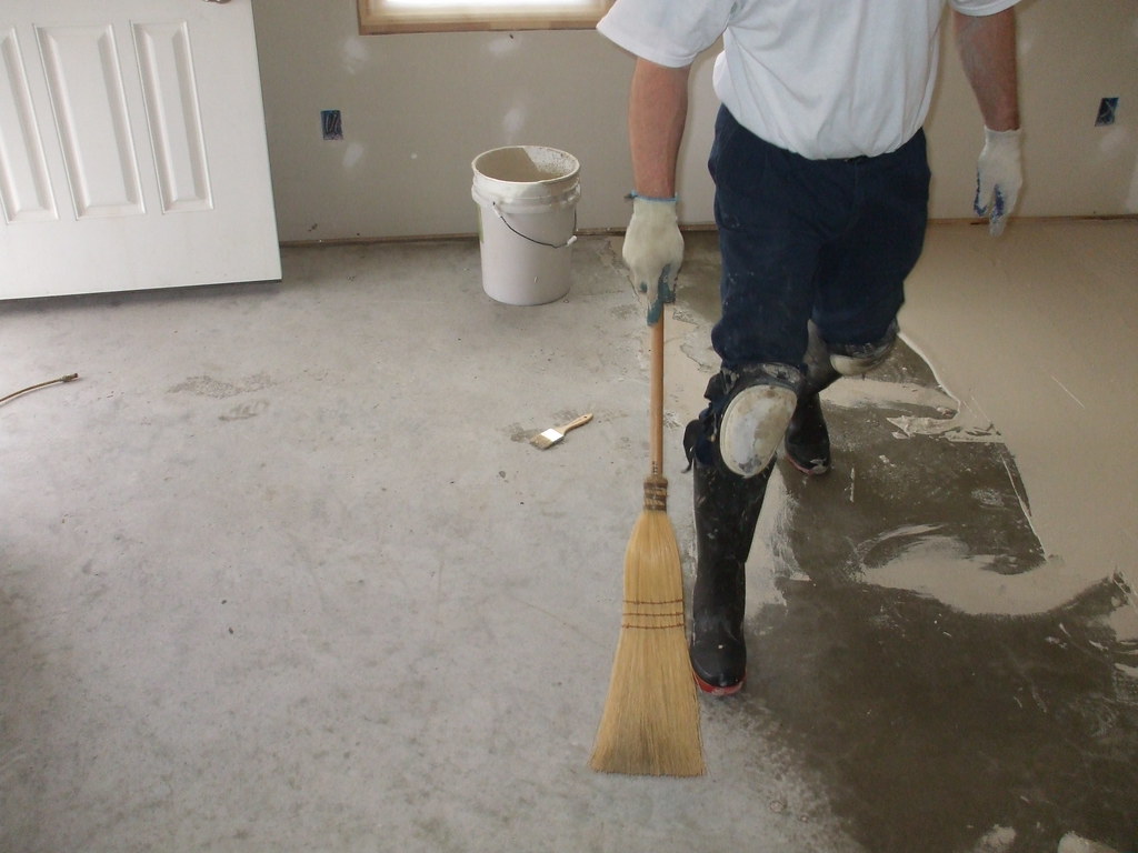 A man cleaning the floor